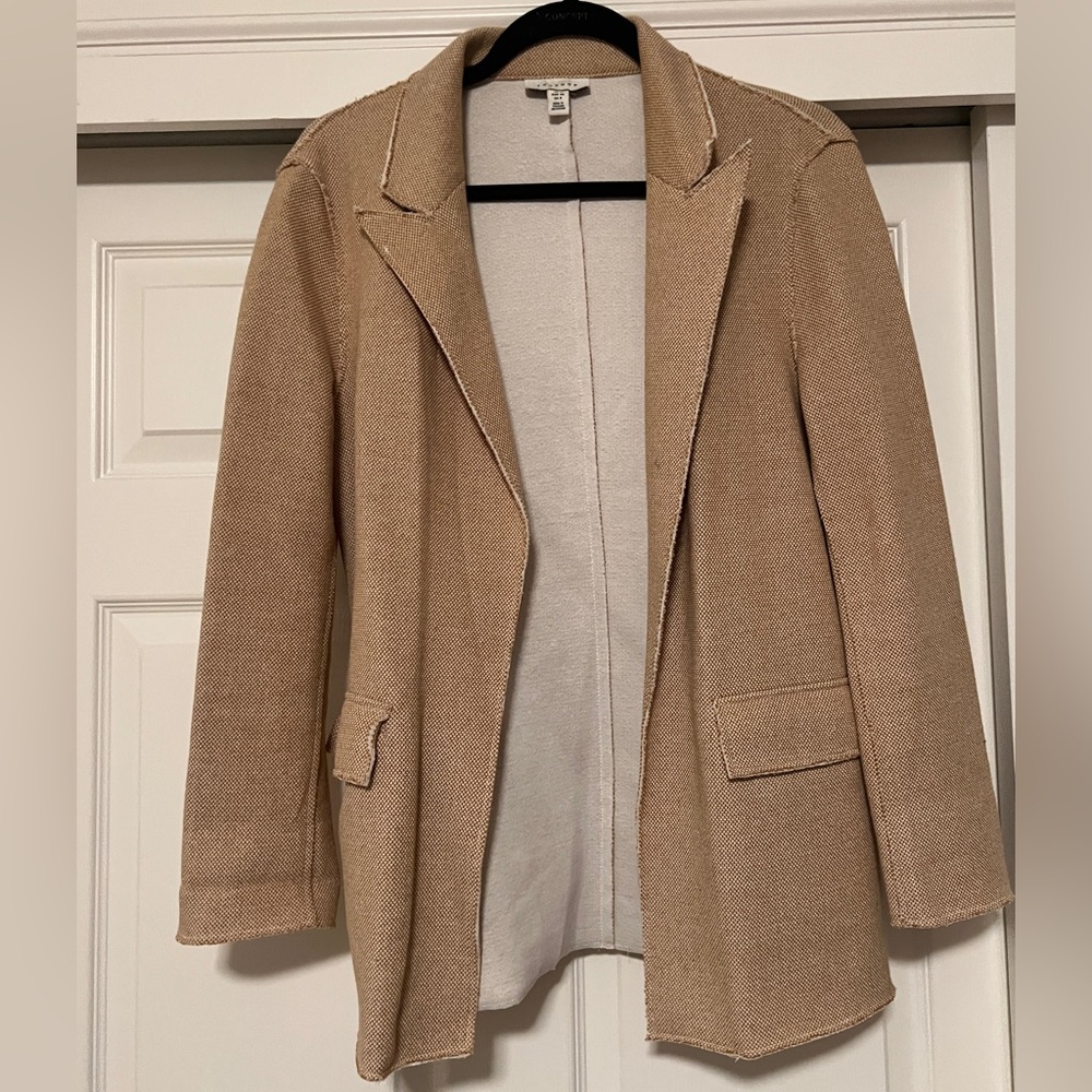 unstructured mustard color blazer. textured look and feel exterior, soft inside